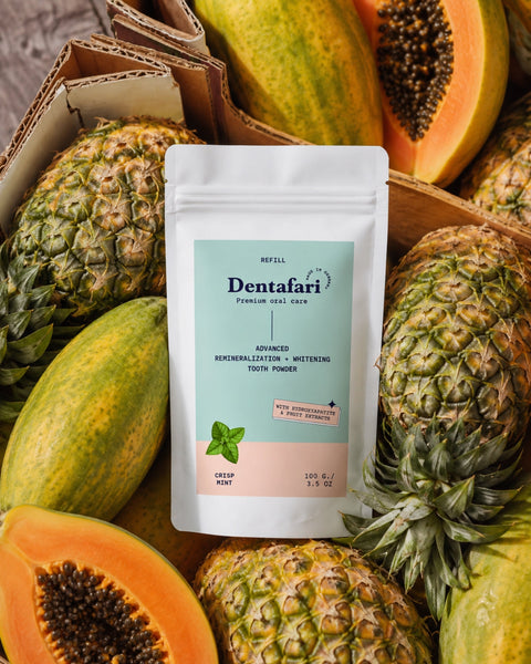 Dentafari Crisp Mint Zahnpulver-Refill auf frischen Ananas und Papayas – natürliche Quellen der Enzyme Bromelain und Papain.